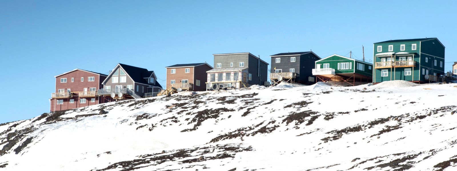 Houses are seen Saturday, April 25, 2015 in Iqaluit, Nunavut. THE CANADIAN PRESS/Paul Chiasson